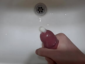 Cumming into Condom connected with Bathroom